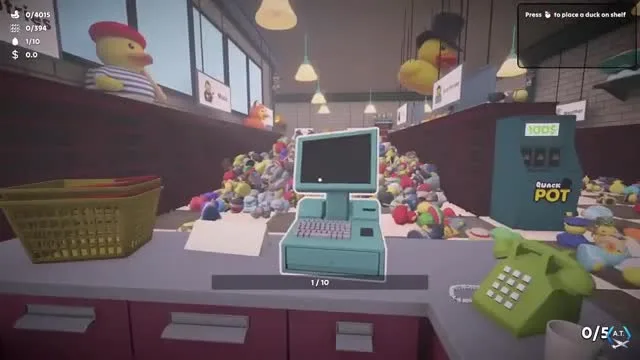 Sort Them Ducks cash register on the shop counter with the unsorted duck pile behind it